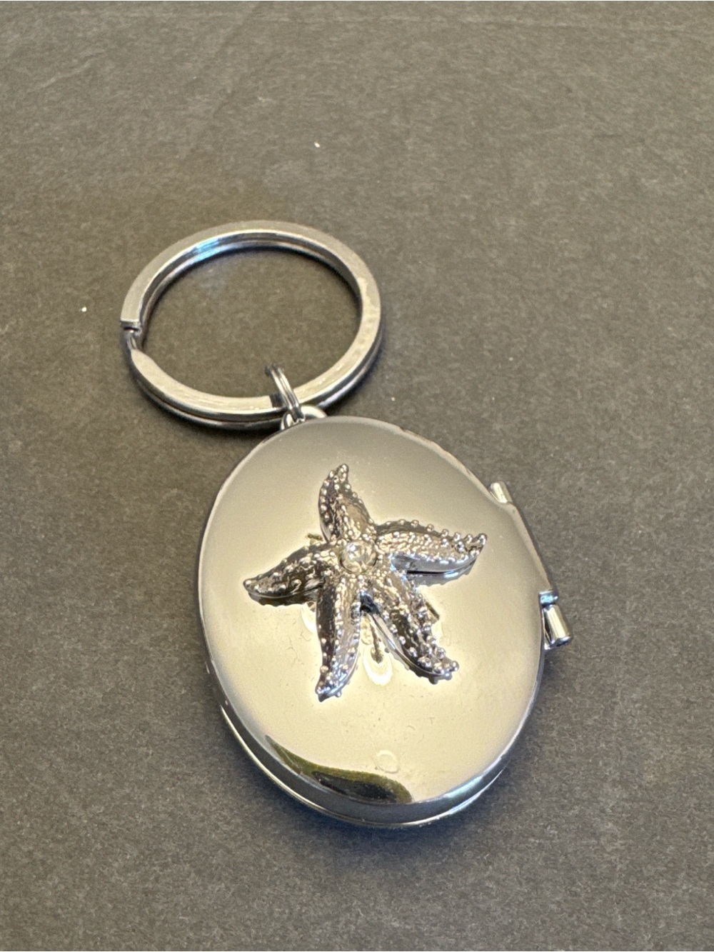 Papyrus Silver Starfish Oval Locket Keyring
